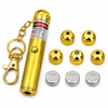 Multi‑head laser pointer with five interchangeable beam caps shown alongside its included batteries.