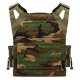 Woodland‑pattern Invictus Gen 2 plate carrier displayed with front MOLLE panel, reinforced stitching, and streamlined cummerbund.