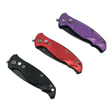 Assorted 12‑piece stainless steel knives shown closed and organized in a display with multiple color options.