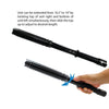 Attitude Adjuster stun baton shown with its flashlight adjustment feature highlighted, displaying the control ring near the light head.