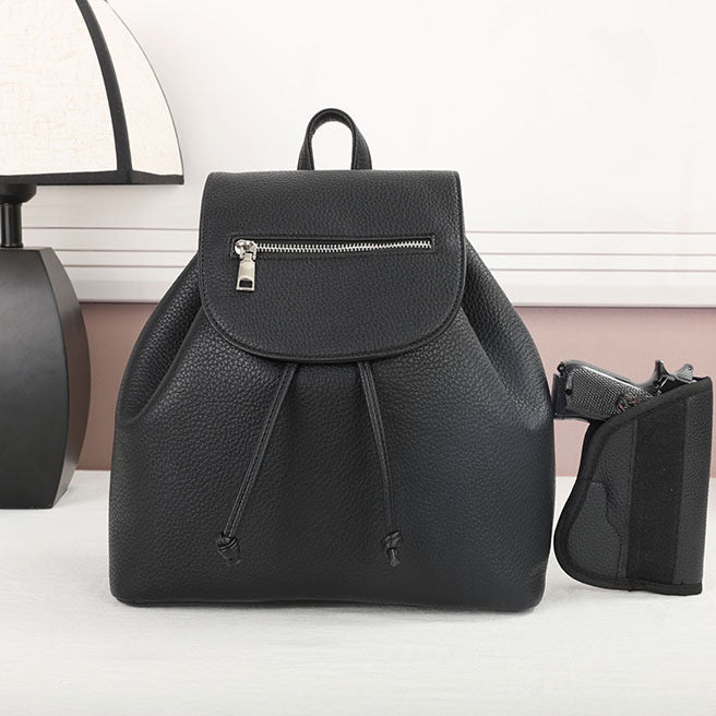Black CCW backpack with rear concealed carry compartment and universal holster.