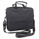 Rear side of a black concealed‑carry laptop briefcase featuring the armor panel compartment and padded structure.