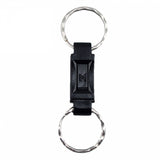 Break‑away key ring shown fully connected, displaying the joined quick‑release mechanism and metal attachment loops.