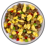 freeze‑dried breakfast skillet meal containing eggs, sausage, cheese, peppers, and potatoes shown ready to eat