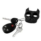 black brutus self‑defense keychain attached to a set of keys, showing size and everyday‑carry use