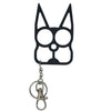 black cat‑shaped metal self‑defense keychain displayed with cutout eye holes and pointed ear design
