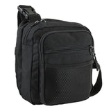 Tactical black CCW satchel shown with the hidden compartment open for quick‑access carry.