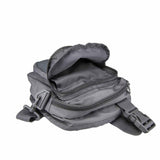 Concealed‑carry satchel showing its hidden side‑access compartment open and empty, with the holster pocket clearly visible.