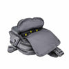 Concealed‑carry satchel showing its hidden side‑access compartment partially open, revealing the reinforced holster pocket.