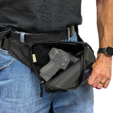 Concealed‑carry fanny pack worn at the waist with the pull‑string activated, showing the rapid‑access opening motion.
