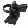 Black Firestorm JPX 2 pepper spray gun shown inside its fitted black holster with retention strap.