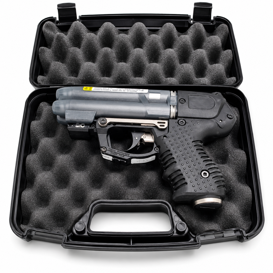 Firestorm JPX 6 black pepper spray gun with integrated laser shown inside its hard carry case with molded interior compartments.