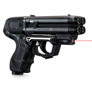 Firestorm JPX 6 black pepper spray gun shown with activated laser light, highlighting its tactical illumination and dual‑barrel design.