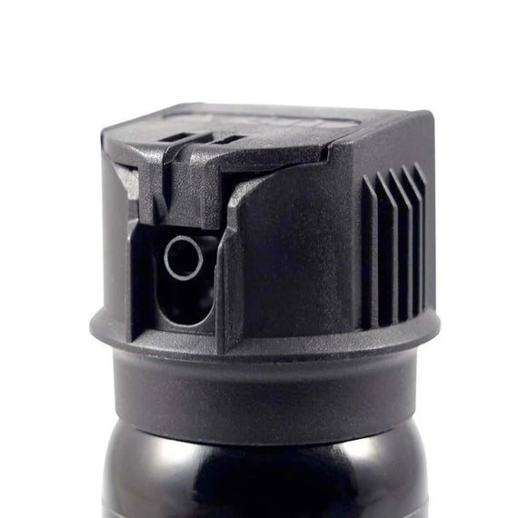 Fox Labs One Point Four Stream Pepper Spray 2 oz with stream spray pattern and UV marking dye.