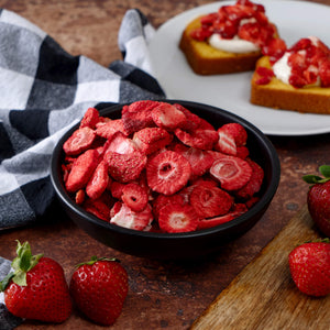 freeze‑dried strawberry slices served in a bowl, shown alongside long‑shelf‑life survival‑food packaging for emergency preparedness