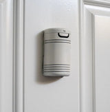 Guardian Angel Home Defender positioned in a mounted, ready‑access location on a door for quick deployment.
