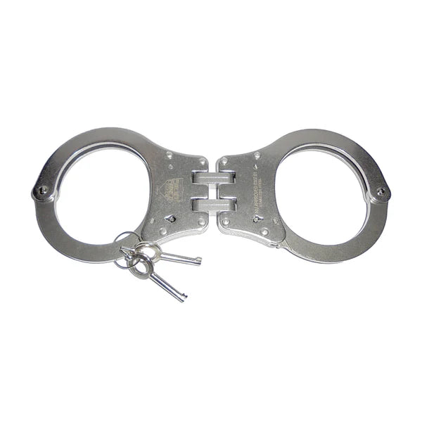Hinged stainless steel NIJ-approved handcuffs with double-lock mechanism, heat-treated construction, and two matching keys.
