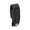 black nylon holster shown upright with flap closed and belt loop visible