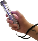 JOLT RhineStun stun flashlight shown in a full‑length view with textured silver rhinestone grip and front light bezel