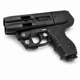 JPX 4 Compact C2 LE black pepper spray gun with integrated laser shown laying flat, highlighting its compact frame and dual‑barrel design.