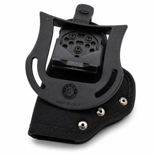 Black paddle‑style holster designed for the JPX 4 Compact, shown with contoured body and wide paddle mount.