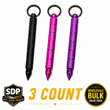 Three kubotan keychain hidden‑knife units in assorted colors displayed side‑by‑side, showing the cylindrical bodies and removable caps that conceal the blades.