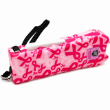 Ladies Choice stun gun shown in a pink finish with a breast‑cancer‑awareness ribbon graphic on the front of the device.