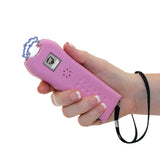 Ladies Choice stun gun shown in a bright pink finish with a compact, curved body design.
