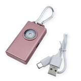 Micro Guard Plus personal alarm keychain with rechargeable COB LED flashlight, flashing strobe light, and aluminum carabiner