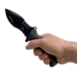 side profile of the spring‑assisted knife showing textured aluminum handle with hand holding the knife