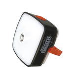 Image highlighting the headlamp’s circular LED lens with its reflective housing.