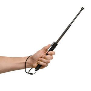 image of the 16‑inch automatic steel baton being held, highlighting the textured handle and compact form