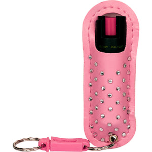 Pepper Shot 1.2% MC pepper spray in a pink rhinestone holster with attached keychain ring.