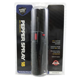 Sealed retail packaging displaying a black hard‑case pepper spray with integrated keychain ring.