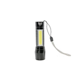 Close‑up front angle of the mini tactical flashlight featuring a wide COB LED strip and rugged black body.