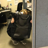 Streetwise Pro‑Tech tote displayed upright showing being used as a sheild for protection