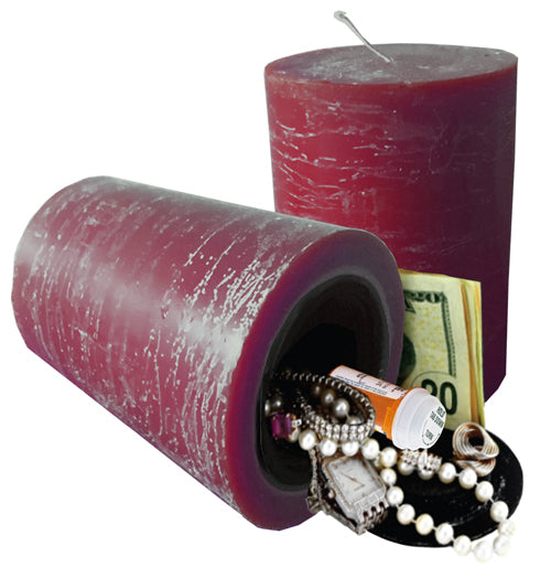 Red candle diversion safe opened to reveal the hidden interior storage compartment.