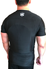 Safe‑T‑Shirt plate carrier with integrated holsters and front/back armor compartments