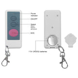 Safety Technology barking dog alarm shown with its handheld remote control featuring buttons for mode selection and activation.