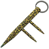 nrown leopard‑print two‑prong kubotan keychain 3‑pack arranged side by side with visible finger grooves and key‑ring attachments