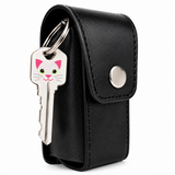 Black Smack stun gun shown inside its fitted holster, highlighting the secure pouch design and belt‑loop attachment.
