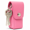 Pink Smack stun gun shown inside its fitted black holster, highlighting the secure pouch and flap closure.