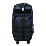 Small tactical backpack in blue with black trim featuring multiple zippered storage compartments.