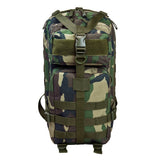 Small tactical backpack in woodland camouflage featuring multiple zippered compartments, front utility pocket, adjustable padded shoulder straps, and durable compact construction for hiking, outdoor adventures, everyday carry, or emergency preparedness gear.