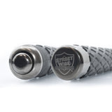 baton expansion mechanism detail on 21‑inch steel baton tip and the botton cap