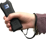 Streetwise Black Jack stun gun shown held in a person’s hand, highlighting its compact size and rubberized grip.