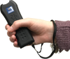 Streetwise Black Jack stun gun shown held in a person’s hand, highlighting its compact size and rubberized grip.