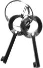 Pair solid‑steel handcuff keys displayed.