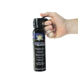 Streetwise 9‑ounce fogger pepper spray with Fire‑Master nozzle shown in hand to display size, grip, and actuator placement.