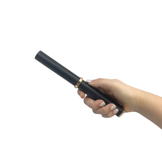 Streetwise Hair Fryer Brush Stun Gun with removable hairbrush head and rechargeable concealed stun device.